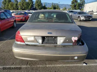 2005 Ford Crown Victoria LX with VIN 2FAFP74W75X129929, listed as a Copart auction lot 89020125 with 156,115 mi miles and Salvage Title. Bid and sale history available at carsss.com. Image 6.
