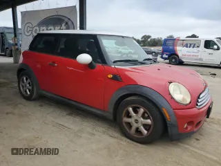 2010 MINI Hardtop with VIN WMWMF3C52ATZ63438, listed as a Copart auction lot 54424245 with 107,201 mi miles and Clean Title. Bid and sale history available at DreamBid. Image 4.