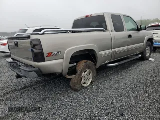2002 Chevrolet Silverado 1500 LT with VIN 2GCEK19T821387813, listed as a Copart auction lot 50596015 with 128,739 mi miles and Salvage Title. Bid and sale history available at carsss.com. Image 3.