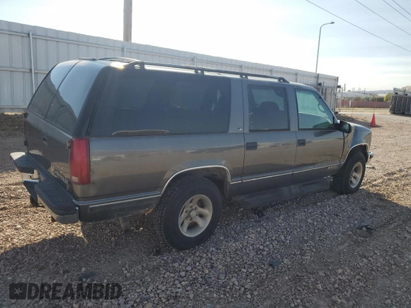 1999 Chevrolet Suburban with VIN 1GNFK16R4XJ483035, listed as a Copart auction lot 76666034 with 215,048 mi miles and Clean Title. Bid and sale history available at carsss.com. Image 3.