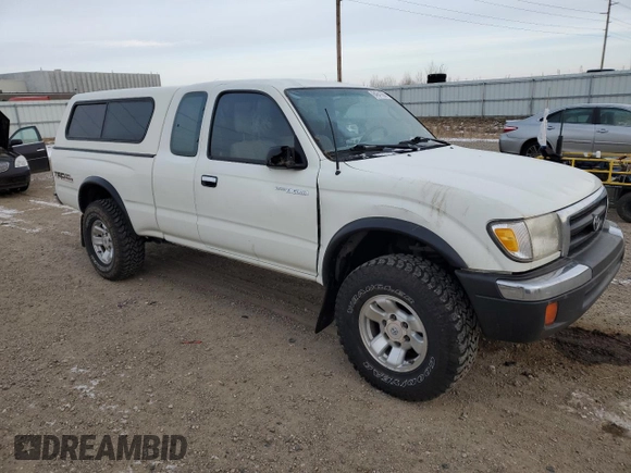 1998 Toyota Tacoma with VIN 4TAWN72N8WZ113174, listed as a Copart auction lot 84641064 with 148,221 mi miles and Salvage Title. Bid and sale history available at DreamBid. Image 4.