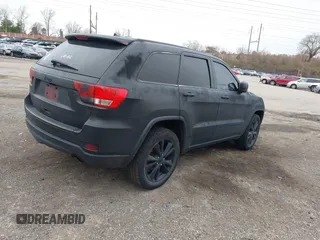 2013 Jeep Grand Cherokee Laredo with VIN 1C4RJEAG2DC573970, listed as a IAAI auction lot 41892914 with 185,050 mi miles. Bid and sale history available at carsss.com. Image 4.