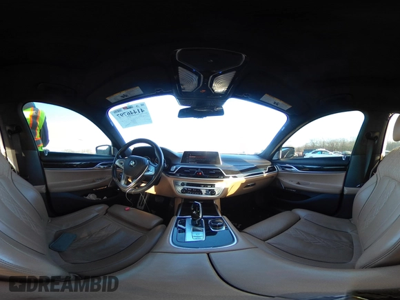 2017 BMW 7 Series 750i with VIN WBA7F0C34HGM21805, listed as a IAAI auction lot 41446797 with 88,753 mi miles and . Bid and sale history available at DreamBid. Image 18.