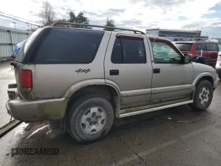 2002 Chevrolet Blazer LS z VIN 1GNDT13WX2K128730, wystawiony jako Copart lot #48050165 z przebiegiem 155 475 mil mil oraz Szkoda całkowita • Salvage title. Historia ofert i sprzedaży dostępna na DreamBid. Obrazek 3.