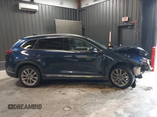 2020 Mazda CX-9 Grand Touring with VIN JM3TCBDY4L0403376, listed as a IAAI auction lot 42357363 with 86,716 mi miles and . Bid and sale history available at DreamBid. Image 13.
