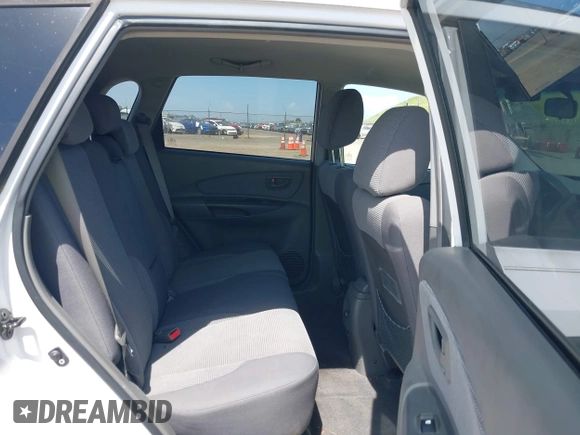 2006 Hyundai Tucson GL with VIN KM8JM12B76U412698, listed as a IAAI auction lot 42055377 with 177,459 mi miles. Bid and sale history available at carsss.com. Image 8.