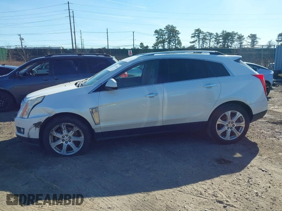 2015 Cadillac SRX Performance Collection with VIN 3GYFNFE35FS573814, listed as a IAAI auction lot 41770696 with 119,205 mi miles and . Bid and sale history available at DreamBid. Image 14.