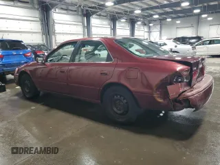 2000 Toyota Camry CE z VIN 4T1BG22K2YU938855, wystawiony jako Copart lot #56047305 z przebiegiem 129 096 mil mil oraz Szkoda całkowita • Salvage title. Historia ofert i sprzedaży dostępna na DreamBid. Obrazek 2.