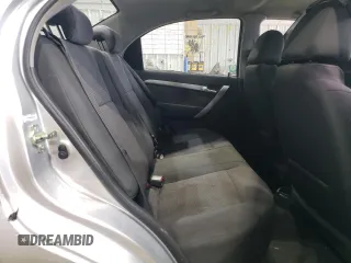 2011 Chevrolet Aveo 1LT z VIN KL1TD5DE6BB154327, wystawiony jako Copart lot #51313085 z przebiegiem 76 402 mil mil oraz Szkoda całkowita • Salvage title. Historia ofert i sprzedaży dostępna na DreamBid. Obrazek 10.