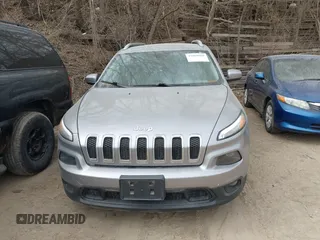 2016 Jeep Cherokee Latitude with VIN 1C4PJMCB7GW252724, listed as a IAAI auction lot 41869060 with 125,119 mi miles. Bid and sale history available at carsss.com. Image 12.