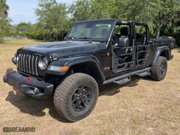 2020 Jeep Gladiator Rubicon with VIN 1C6JJTBG3LL117899, listed as a Copart auction lot 54328235 with 52,674 mi miles and Non Repairable. Bid and sale history available at carsss.com. Image 2.