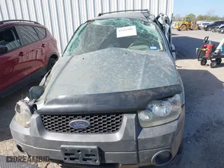 2005 Ford Escape XLT with VIN 1FMYU03175KA84787, listed as a IAAI auction lot 41814099 with 168,342 mi miles. Bid and sale history available at carsss.com. Image 12.