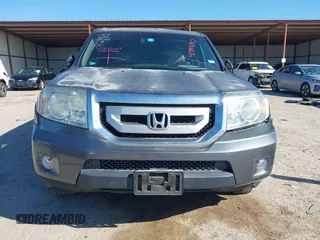 2011 Honda Pilot EX-L with VIN 5FNYF3H64BB056071, listed as a IAAI auction lot 41841047 with 112,114 mi miles and . Bid and sale history available at carsss.com. Image 12.
