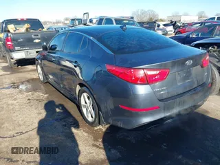 2015 Kia Optima LX with VIN KNAGM4A72F5543977, listed as a IAAI auction lot 41328035 with 153,805 mi miles and . Bid and sale history available at DreamBid. Image 3.