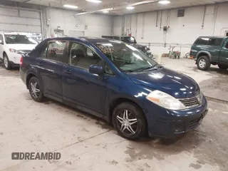 2009 Nissan Versa 1.8 S with VIN 3N1BC11E79L440560, listed as a IAAI auction lot 41975289 with 158,726 mi miles. Bid and sale history available at carsss.com. Image 1.