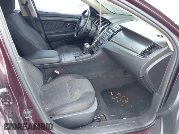 2011 Ford Taurus SEL with VIN 1FAHP2EW4BG115630, listed as a IAAI auction lot 41276945 with 166,867 mi miles. Bid and sale history available at carsss.com. Image 5.