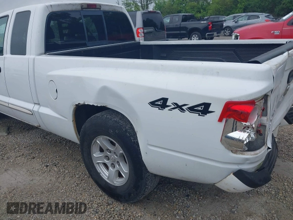 2005 Dodge Dakota SLT with VIN 1D7HW42N75S213191, listed as a IAAI auction lot 42345554 with 152,833 mi miles and . Bid and sale history available at DreamBid. Image 12.