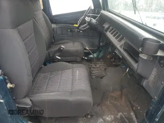 1995 Jeep Wrangler S with VIN 1J4FY19P6SP296140, listed as a Copart auction lot 72147134 with 182,049 mi miles and Salvage Title. Bid and sale history available at carsss.com. Image 7.