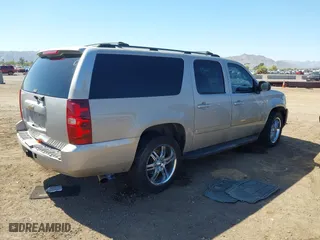 2007 Chevrolet Suburban LT with VIN 1GNFC16J87J230680, listed as a IAAI auction lot 42111804 with 1 mi miles. Bid and sale history available at carsss.com. Image 4.