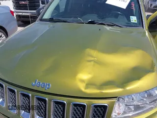 2012 Jeep Compass Latitude with VIN 1C4NJCEB9CD688401, listed as a IAAI auction lot 41801282 with 154,059 mi miles and . Bid and sale history available at carsss.com. Image 10.