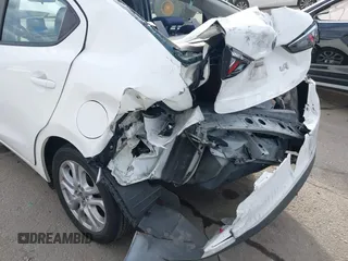 2016 Scion iA z VIN 3MYDLBZV9GY139080, wystawiony jako IAAI lot #41494384 z przebiegiem 106 092 mil mil oraz . Historia ofert i sprzedaży dostępna na DreamBid. Obrazek 6.