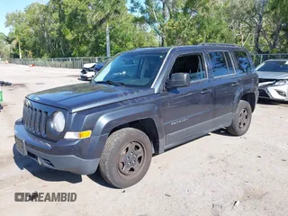2014 Jeep Patriot Sport with VIN 1C4NJPBBXED911558, listed as a IAAI auction lot 42066449 with 107,208 mi miles. Bid and sale history available at carsss.com. Image 2.