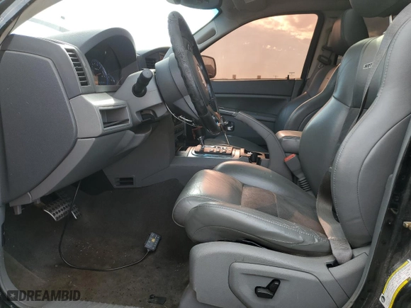 2007 Jeep Grand Cherokee SRT-8 with VIN 1J8HR78357C502665, listed as a Copart auction lot 84772624 with 153,311 mi miles and Clean Title. Bid and sale history available at carsss.com. Image 7.