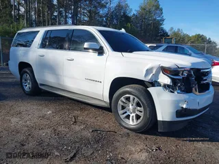 2015 Chevrolet Suburban LT with VIN 1GNSCJKC2FR607249, listed as a IAAI auction lot 41258843 with 192,208 mi miles. Bid and sale history available at carsss.com. Image 1.