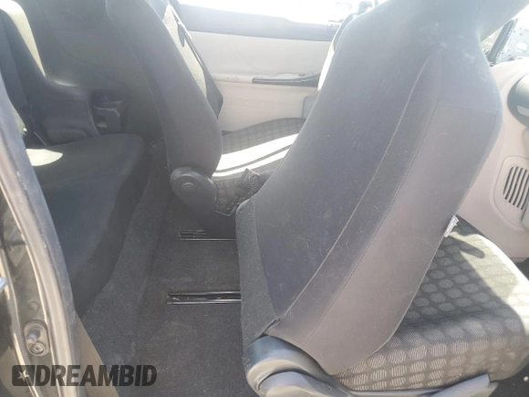2012 Scion iQ z VIN JTNJJXB05CJ017720, wystawiony jako Copart lot #56152325 z przebiegiem 164 031 mil mil oraz Szkoda całkowita • Salvage title. Historia ofert i sprzedaży dostępna na DreamBid. Obrazek 10.