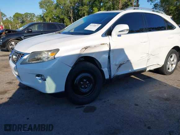 2013 Lexus RX 350 z VIN 2T2ZK1BA9DC106404, wystawiony jako IAAI lot #41774877 z przebiegiem 153 201 mil mil oraz . Historia ofert i sprzedaży dostępna na DreamBid. Obrazek 6.