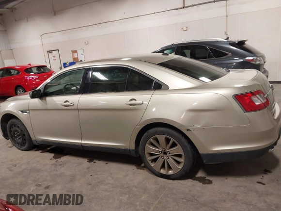2010 Ford Taurus Limited with VIN 1FAHP2FW9AG133764, listed as a IAAI auction lot 41823527 with 243,477 mi miles and . Bid and sale history available at DreamBid. Image 15.