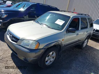 2004 Mazda Tribute LX with VIN 4F2YZ041X4KM23352, listed as a IAAI auction lot 41605357 with 276,243 mi miles and . Bid and sale history available at DreamBid. Image 2.