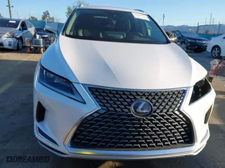 2022 Lexus RX with VIN 2T2HGMDA8NC074588, listed as a IAAI auction lot 41828234 with 106,845 mi miles. Bid and sale history available at carsss.com. Image 13.
