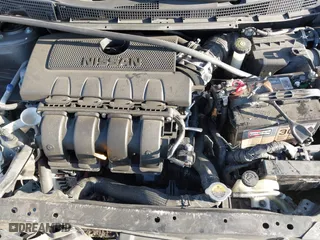 2015 Nissan Sentra S with VIN 3N1AB7AP4FY372638, listed as a IAAI auction lot 42004029 with 152,466 mi miles. Bid and sale history available at carsss.com. Image 10.