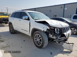 2018 Jeep Grand Cherokee Limited with VIN 1C4RJEBG8JC338712, listed as a Copart auction lot 57885155 with 149,826 mi miles and Salvage title. Bid and sale history available at DreamBid. Image 4.