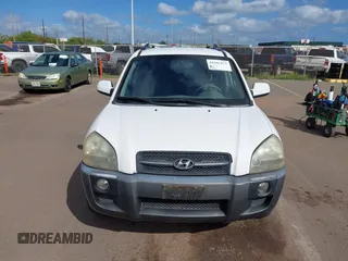 2006 Hyundai Tucson GLS with VIN KM8JN12D06U368350, listed as a IAAI auction lot 41645473 with 127,217 mi miles. Bid and sale history available at carsss.com. Image 6.
