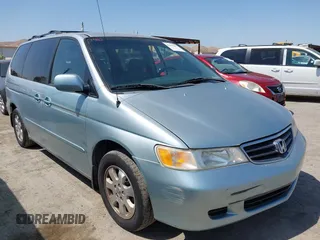 2003 Honda Odyssey EX z VIN 2HKRL18633H502246, wystawiony jako IAAI lot #42414427 z przebiegiem 251 759 mil mil oraz . Historia ofert i sprzedaży dostępna na DreamBid. Obrazek 1.