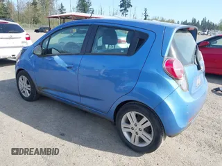 2015 Chevrolet Spark LS with VIN KL8CB6S94FC751401, listed as a IAAI auction lot 42032919 with 61,149 mi miles and . Bid and sale history available at DreamBid. Image 3.