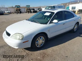 2003 Mercury Sable LS Premium with VIN 1MEHM55S73G630347, listed as a IAAI auction lot 41427588 with 125,285 mi miles. Bid and sale history available at carsss.com. Image 2.