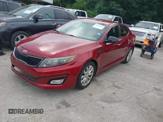 2014 Kia Optima EX z VIN 5XXGN4A71EG284280, wystawiony jako IAAI lot #42278795 z przebiegiem 179 200 mil mil oraz . Historia ofert i sprzedaży dostępna na DreamBid. Obrazek 2.