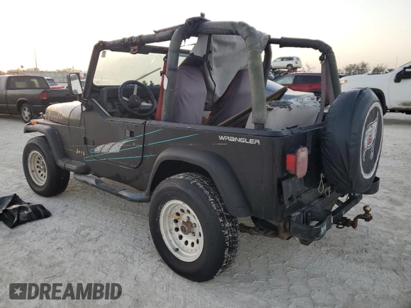 1992 Jeep Wrangler with VIN 2J4FY29SXNJ554171, listed as a Copart auction lot 77655294 with 115,494 mi miles and Salvage Title. Bid and sale history available at carsss.com. Image 2.