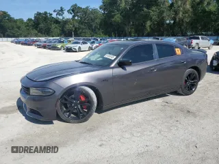 2016 Dodge Charger R/T with VIN 2C3CDXCT2GH237566, listed as a Copart auction lot 61456765 with 152,524 mi miles and Salvage title. Bid and sale history available at DreamBid. Image 1.
