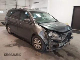 2010 Honda Odyssey EX-L with VIN 5FNRL3H7XAB080170, listed as a IAAI auction lot 41241879 with 221,272 mi miles. Bid and sale history available at carsss.com. Image 1.