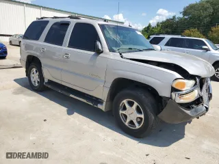 2005 GMC Yukon Denali with VIN 1GKEK63U45J171664, listed as a Copart auction lot 69489554 with 234,997 mi miles and Salvage Title. Bid and sale history available at carsss.com. Image 4.