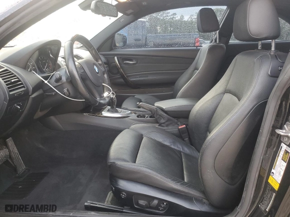 2011 BMW 1 Series 135i with VIN WBAUC9C53BVM09102, listed as a Copart auction lot 80942534 with 132,038 mi miles and Salvage Title. Bid and sale history available at carsss.com. Image 7.
