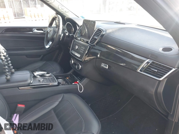 2018 Mercedes-Benz GLS with VIN 4JGDF6EE7JB098694, listed as a IAAI auction lot 41294697 with 104,807 mi miles. Bid and sale history available at carsss.com. Image 5.
