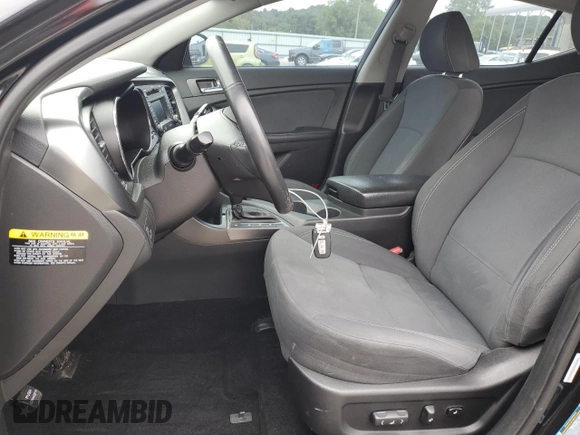 2013 Kia Optima Hybrid LX with VIN KNAGM4AD2D5060797, listed as a Copart auction lot 57006234 with 119,443 mi miles and Clean Title. Bid and sale history available at carsss.com. Image 7.