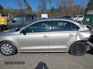 2014 Volkswagen Jetta S with VIN 3VW2K7AJ3EM207910, listed as a IAAI auction lot 41759225 with 179,341 mi miles and . Bid and sale history available at DreamBid. Image 14.