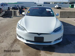 2020 Tesla Model S Long Range with VIN 5YJSA1E23LF360441, listed as a IAAI auction lot 41312865 with 68,967 mi miles and . Bid and sale history available at DreamBid. Image 12.