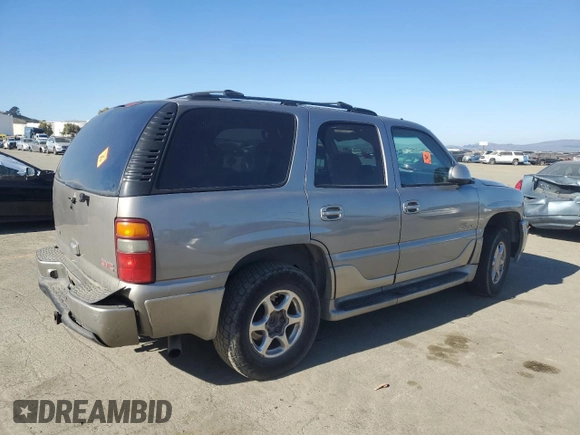 2003 GMC Yukon Denali z VIN 1GKEK63U93J339277, wystawiony jako Copart lot #42454275 z przebiegiem Nie podano mil oraz Szkody całkowita. Historia ofert i sprzedaży dostępna na DreamBid. Obrazek 3.